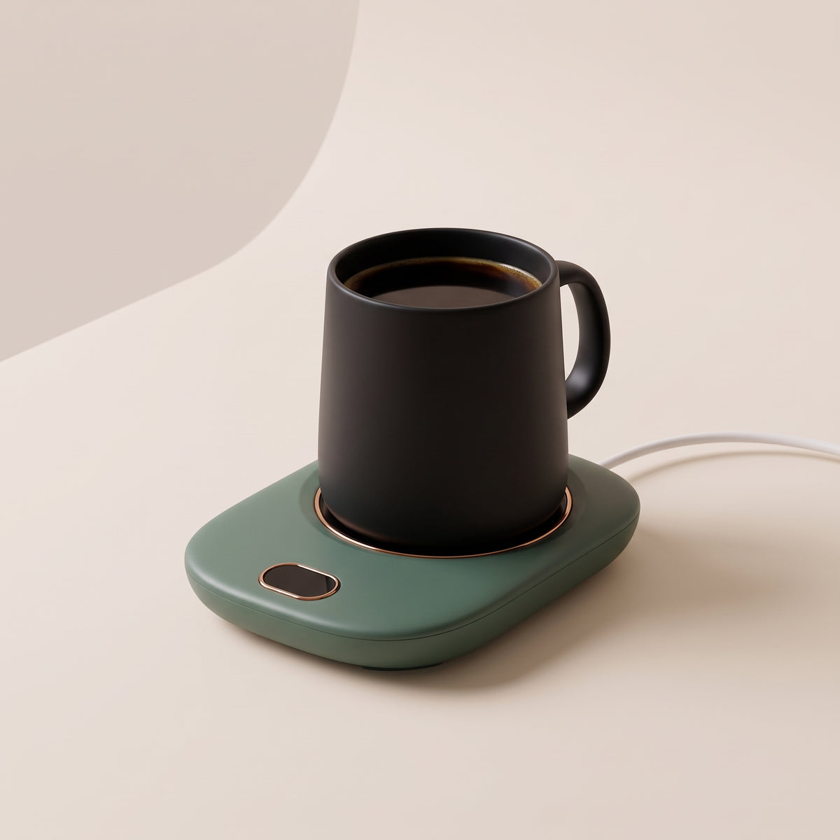 Green Warm Regards mug warmer with a black coffee mug on a clean cream background