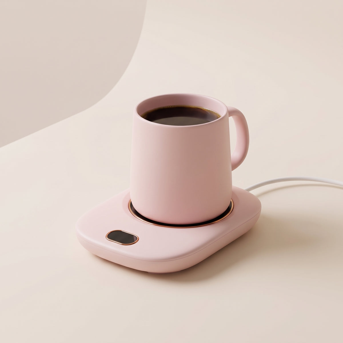 Pink Warm Regards mug warmer with a pink coffee mug on a clean cream background